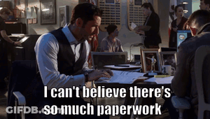A Man Sitting At A Desk With The Words " I Can 'T Believe There 'S So Much Paperwork " GIF