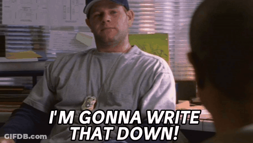 A Man Sitting At A Desk With The Words I 'M Gonna Write That Down On His Shirt GIF