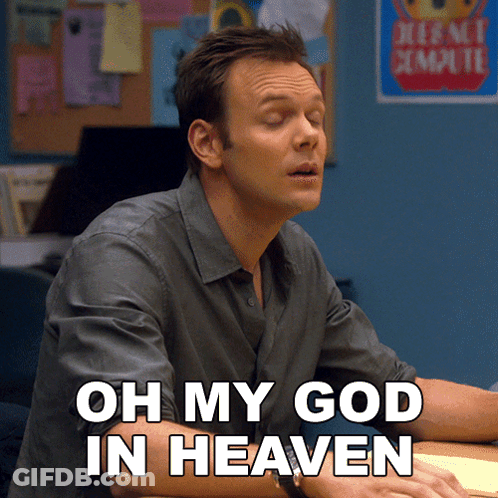 A Man Sitting At A Desk With The Words Oh My God In Heaven Written Below Him GIF