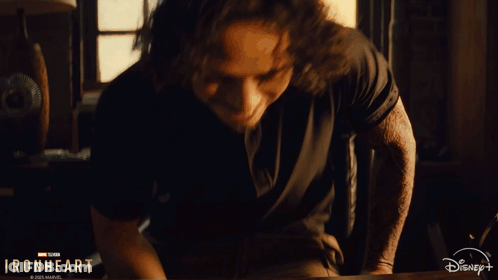 A Man Sitting At A Desk With The Words " What 'S The Difference " On The Bottom GIF