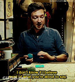 A Man Sitting At A Table Says I Don 'T Know If I Believe Most Of What You Re About To Say GIF