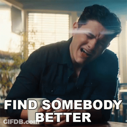 A Man Sitting At A Table With A Cup Of Coffee And The Words Find Somebody Better GIF