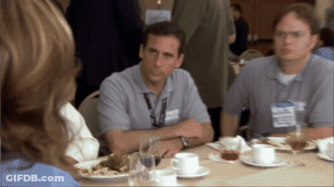 A Man Sitting At A Table With A Name Tag That Says ' Steve Jobs ' On It GIF