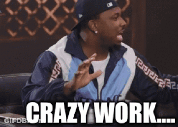 A Man Sitting At A Table With The Words Crazy Work Written On It GIF
