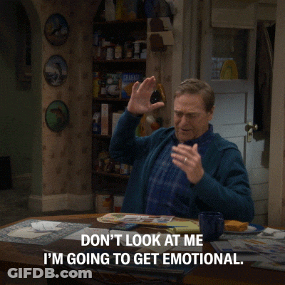 A Man Sitting At A Table With The Words " Don 'T Look At Me I 'M Going To Get Emotional " Above Him GIF