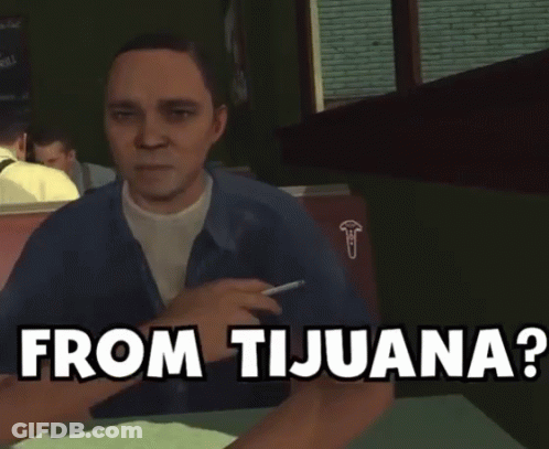 A Man Sitting At A Table With The Words From Tijuana Written Above Him GIF