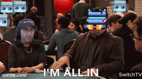 A Man Sitting At A Table With The Words I 'M All In GIF