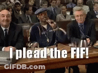 A Man Sitting At A Table With The Words I Plead The Fif GIF