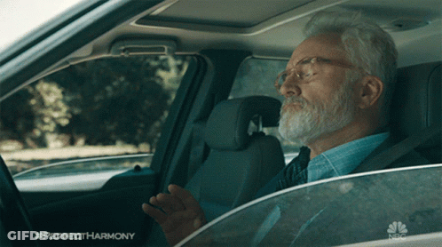 A Man Sitting In A Car With The Hashtag Perfectharmony GIF