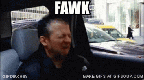 A Man Sitting In A Car With The Word Fawk On The Screen GIF