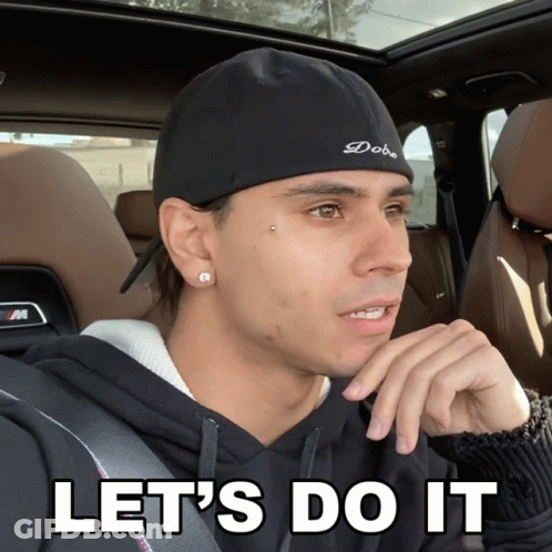 A Man Sitting In A Car With The Words Let 'S Do It Below Him GIF