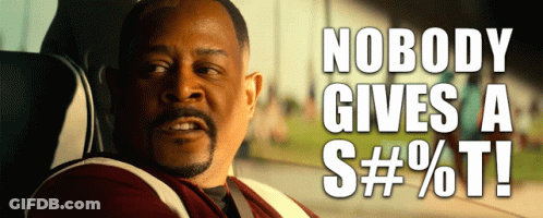 A Man Sitting In A Car With The Words Nobody Gives A S # % T Written Above Him GIF