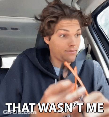 A Man Sitting In A Car With The Words That Wasn 'T Me On The Bottom GIF