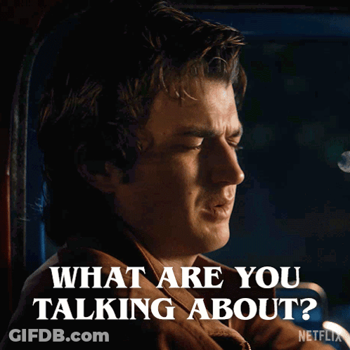 A Man Sitting In A Car With The Words What Are You Talking About Below Him GIF
