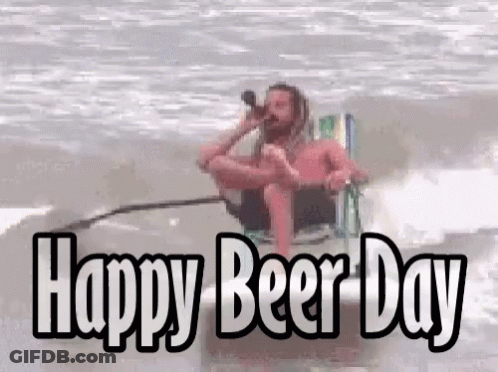 A Man Sitting In A Chair Drinking Beer With The Words Happy Beer Day GIF