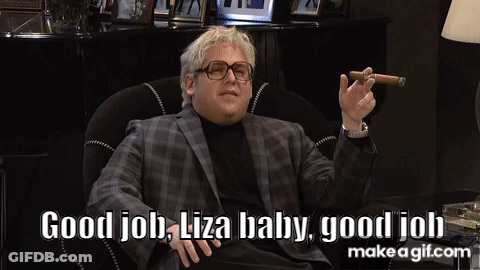 A Man Sitting In A Chair Smoking A Cigar And Says Good Job Liza Baby Good Job GIF