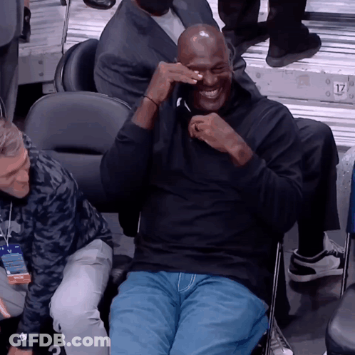 A Man Sitting In A Chair With The Number 17 On The Back Of His Shirt GIF