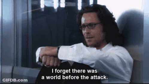 Man Sitting With Words I Forget There Was A World Before The Attack GIF