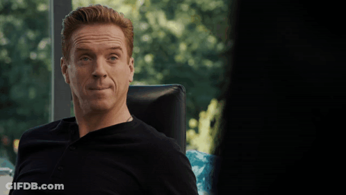A Man Sitting In A Chair With The Words " I Need To See It " On The Bottom GIF