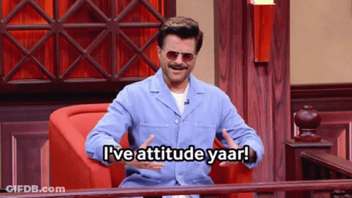 A Man Sitting In A Chair With The Words I 'Ve Attitude Yaar GIF
