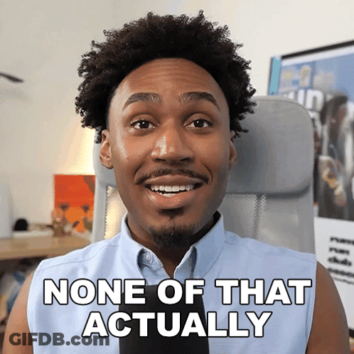 A Man Sitting In A Chair With The Words None Of That Actually On His Shirt GIF