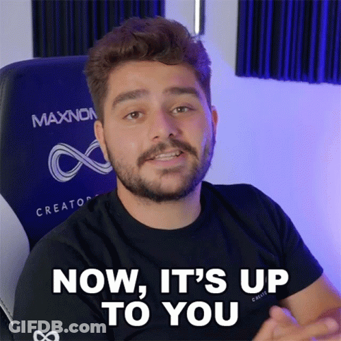 A Man Sitting In A Chair With The Words Now It 'S Up To You Above Him GIF