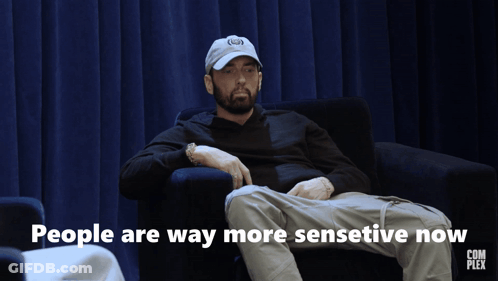 A Man Sitting In A Chair With The Words People Are Way More Sensitive Now On The Bottom GIF