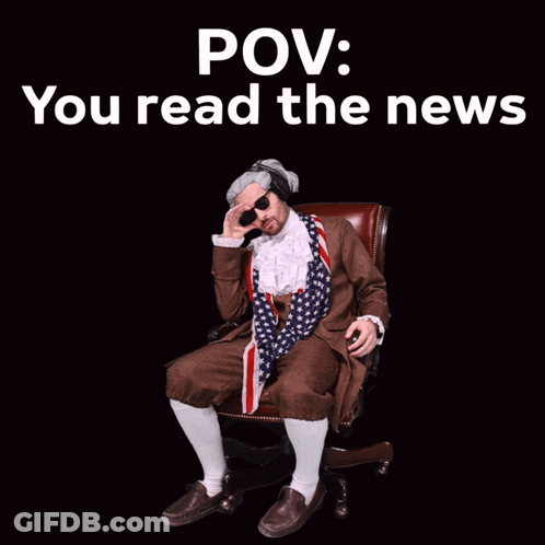 Man Sitting In Chair Reading News GIF