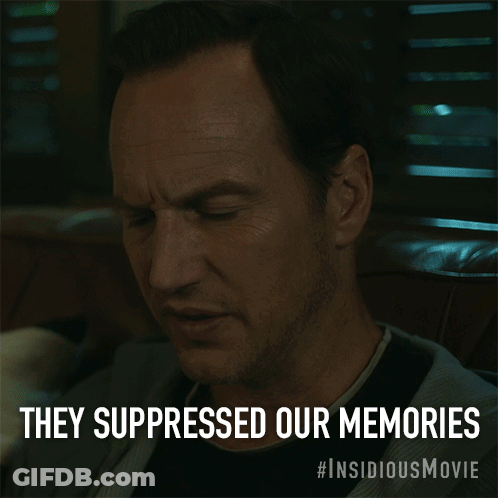 A Man Sitting In A Chair With The Words They Suppressed Our Memories Above Him GIF