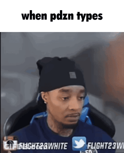 A Man Sitting In A Chair With The Words When Pdzn Types GIF