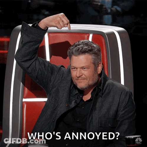 A Man Sitting In A Chair With The Words Who 'S Annoyed Written On The Bottom GIF