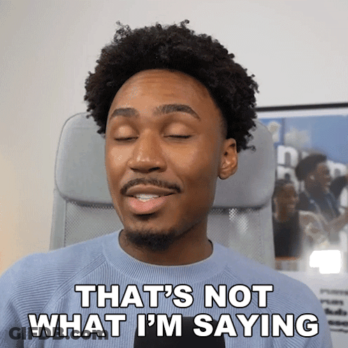 A Man Sitting In An Office Chair With His Eyes Closed And Says " That 'S Not What I 'M Saying " GIF