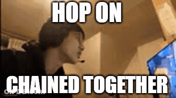 A Man Sitting In Front Of A Computer With The Words Hop On Chained Together Written On The Screen GIF