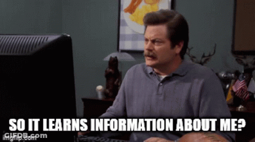 A Man Sitting In Front Of A Computer With The Words So It Learns Information About Me Written Below Him GIF