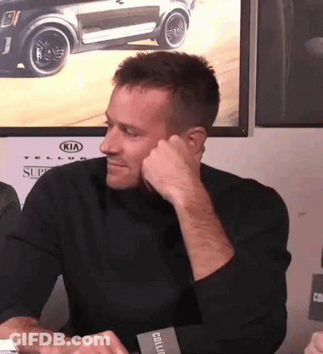 A Man Sitting In Front Of A Kia Car GIF