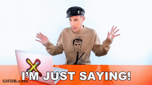 A Man Sitting In Front Of A Laptop With The Words I 'M Just Saying Written Below Him GIF