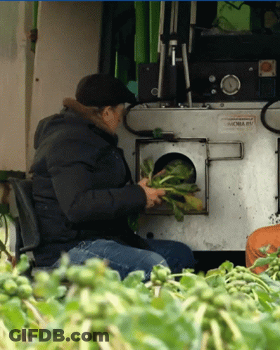 A Man Sitting In Front Of A Machine That Says Moba Ev On It GIF