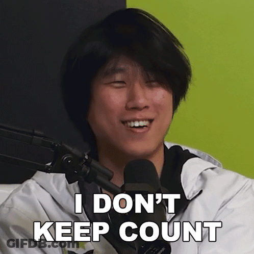 A Man Sitting In Front Of A Microphone Says I Don 'T Keep Count GIF