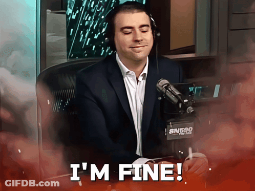 A Man Sitting In Front Of A Microphone With The Words I 'M Fine On The Bottom GIF