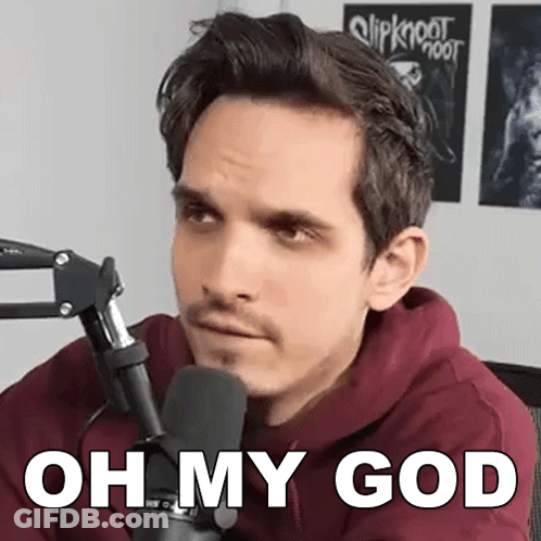 A Man Sitting In Front Of A Microphone With The Words Oh My God Written On His Face . GIF