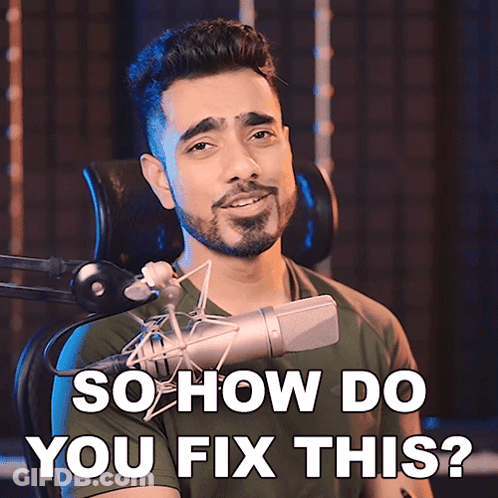 A Man Sitting In Front Of A Microphone With The Words So How Do You Fix This Behind Him GIF