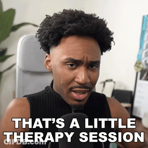 A Man Sitting In Front Of A Microphone With The Words That 'S A Little Therapy Session Above Him GIF
