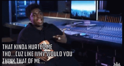 A Man Sitting In Front Of A Mixer With The Words That Kinda Hurted Me GIF