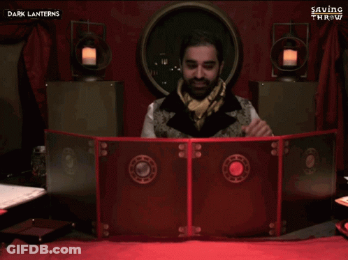 A Man Sitting In Front Of A Screen With The Words That Lady 'S Back On It GIF