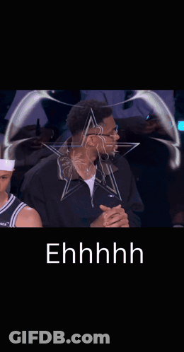 A Man Sitting In Front Of A Star With The Word Ehhhh On It GIF