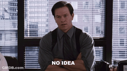 A Man Sitting In Front Of A Window With His Arms Crossed Says No Idea GIF
