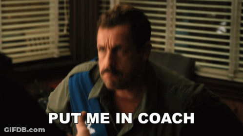 A Man Sitting In Front Of A Window With The Words Put Me In Coach Below Him GIF