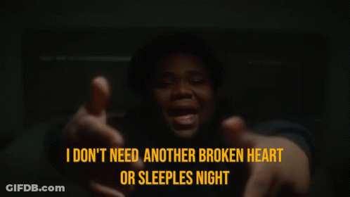 A Man Sitting On A Bed With His Hands On His Head And The Words I Don T Need Another Broken Heart Or Sleeples Night GIF