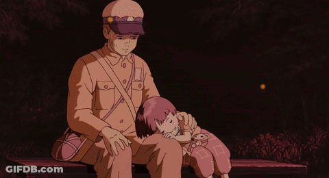A Man Sitting On A Bench Holding A Little Girl Who Is Sleeping On His Lap GIF