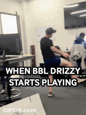 A Man Sitting On A Chair With The Words When Bbl Drizzy Starts Playing GIF